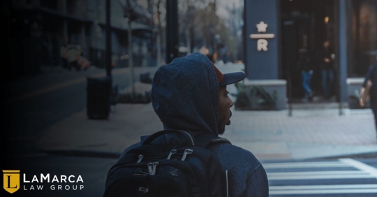 pedestrian looking for cars
