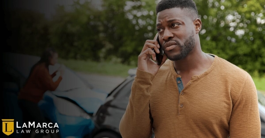 man reporting a car accident