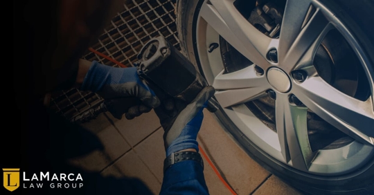 person checking a tire