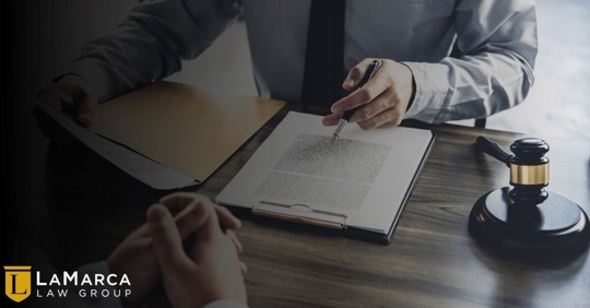 man pointing at legal documents