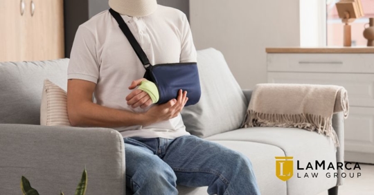 man with injured arm