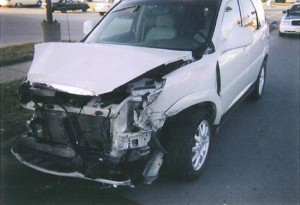 Front of an SUV that has been smashed in the front